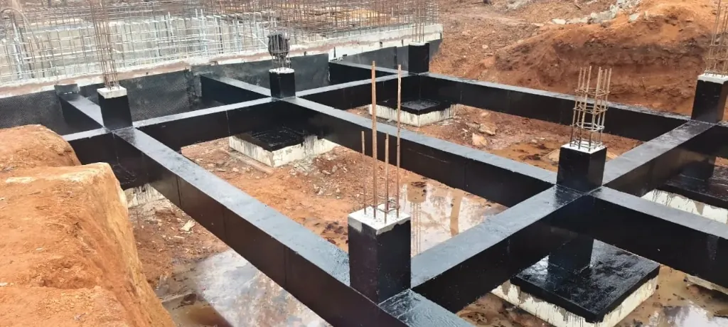 Black waterproof coating applied to foundation tie beams